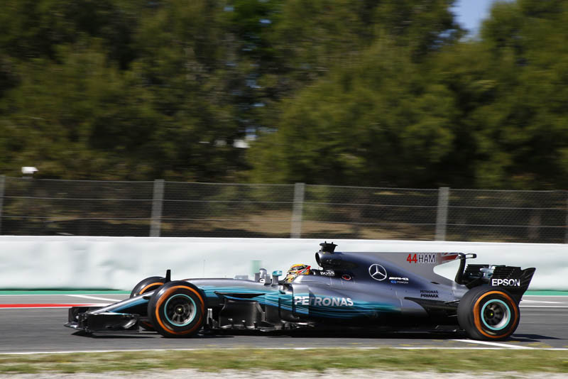 Lewis Hamilton secures pole in Spain